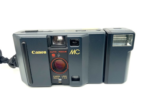 Canon point shoot con - con, 35
